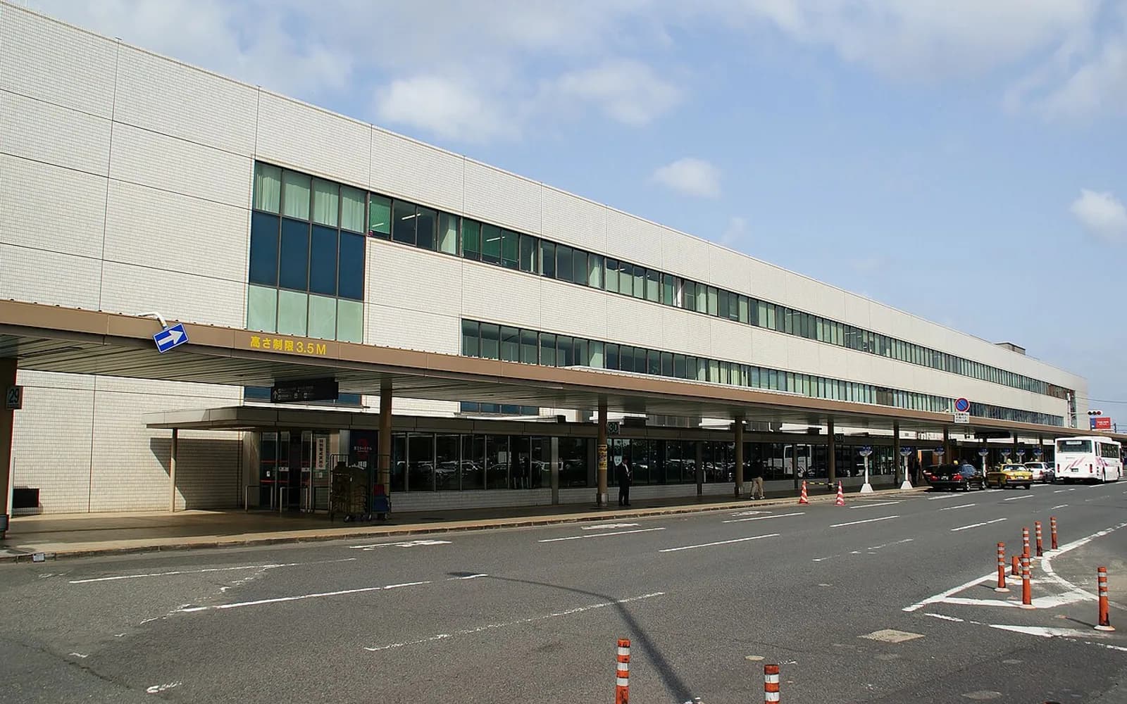 Fukuoka Airport terminal exterior for Kyushu airport transfer planning.