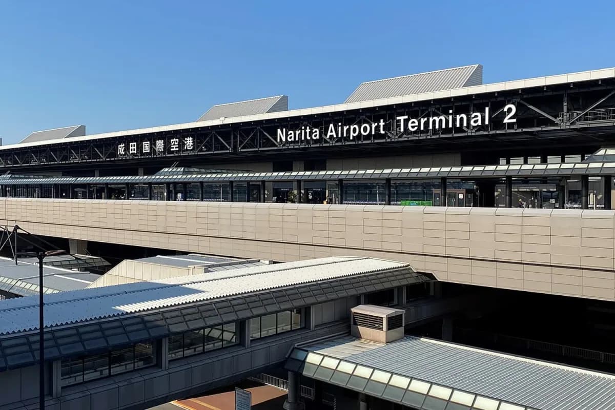 Narita Airport terminal exterior for airport transfer planning.